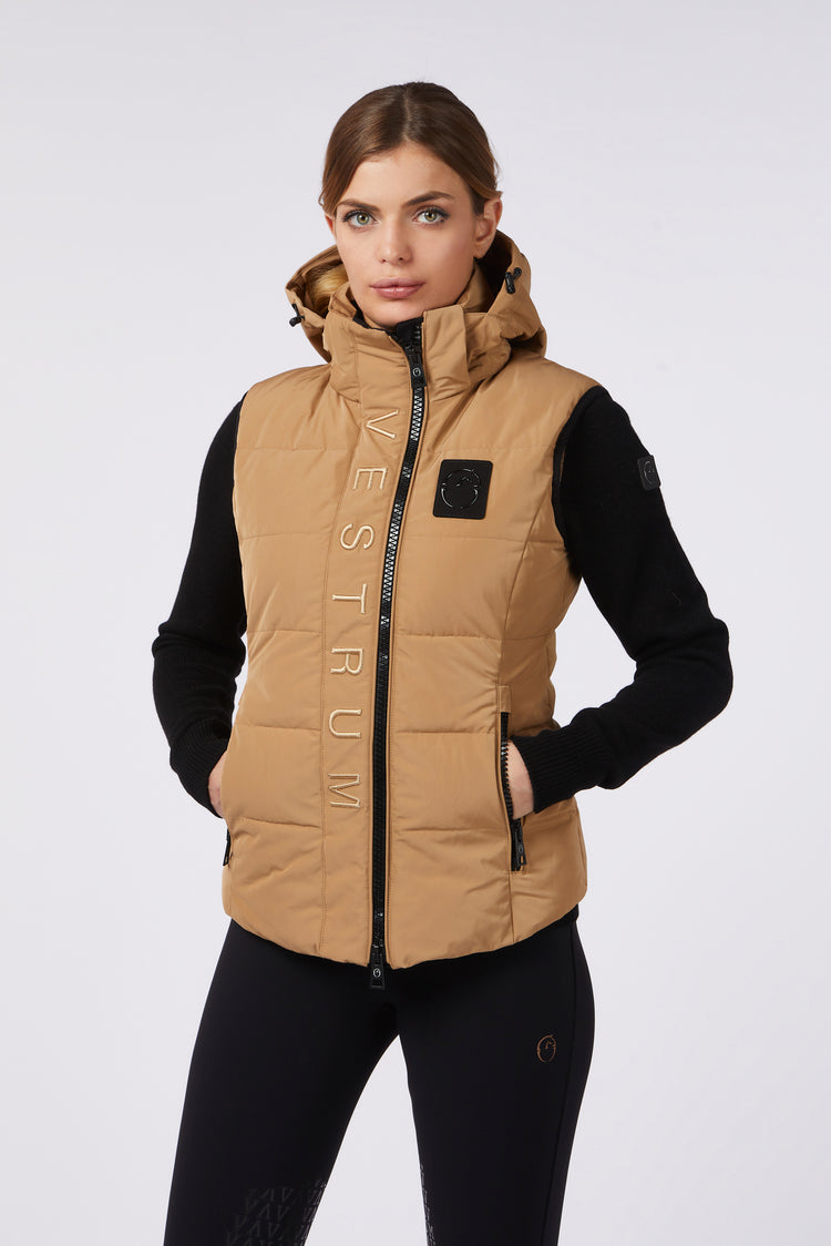 Vestrum light brown vest with large text on the front