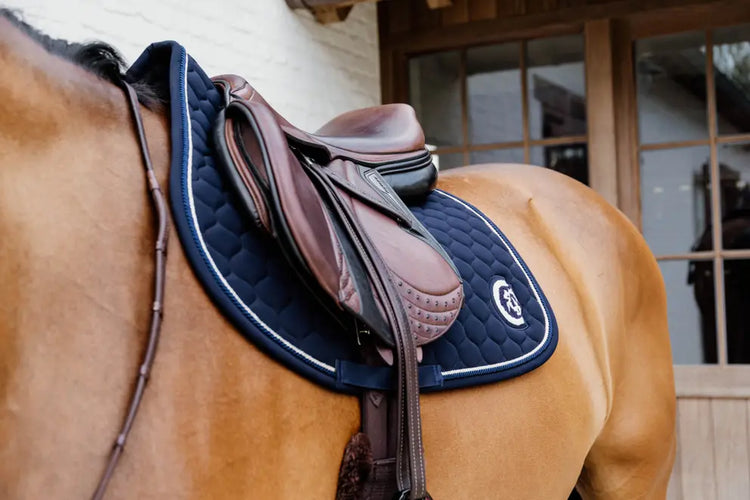 Animal friendly saddle pad